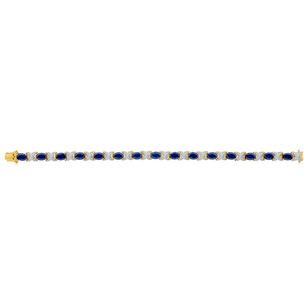 9ct Yellow Gold 7x5mm Oval Cut Created Sapphire and Diamond 19cm Crossover Bracelet - Image 3