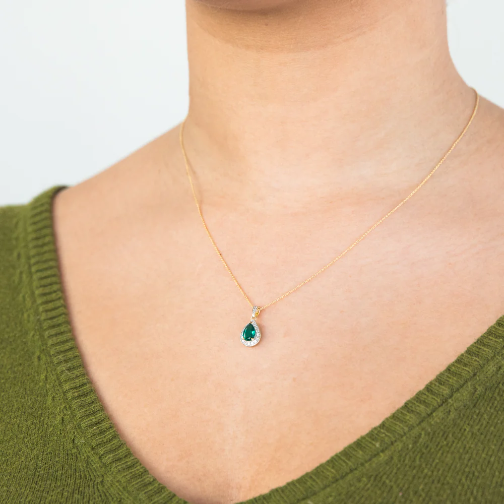 9ct Yellow Gold Created Emerald and 0.15 Carat Diamond Pear Halo Pendant on 45cm Chain - Image 2
