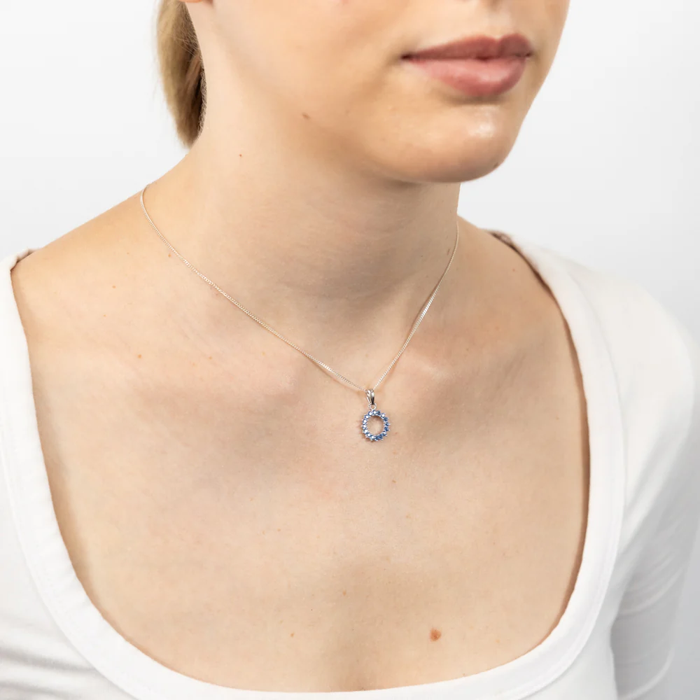 Sterling Silver Aquamarine Blue Cubic Zirconia Circle of Life Pendant - Image 2