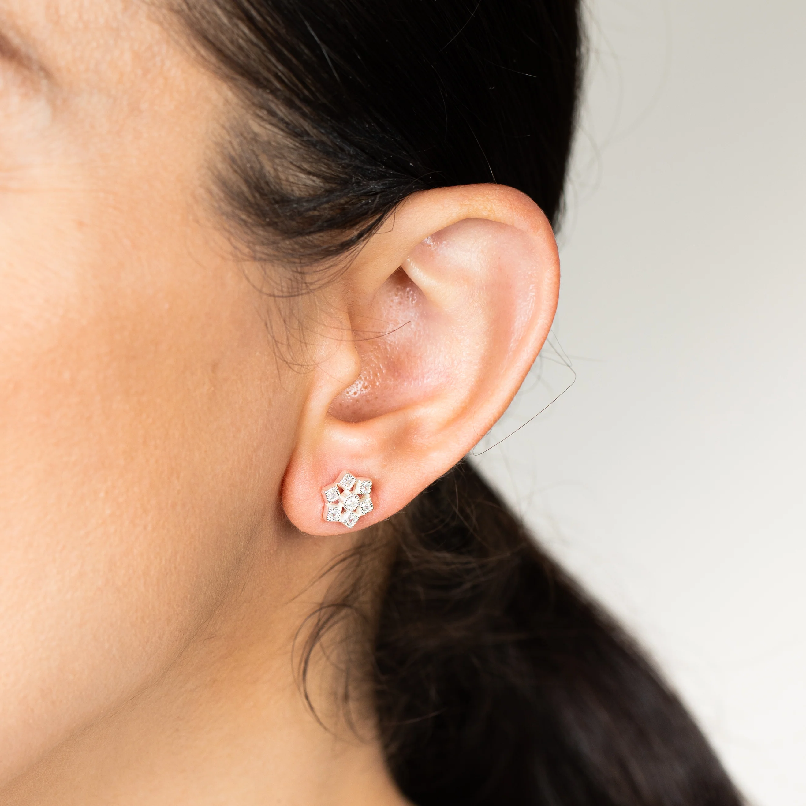 Sterling Silver Geometric Flower Cubic Zirconia Stud Earrings - Image 2