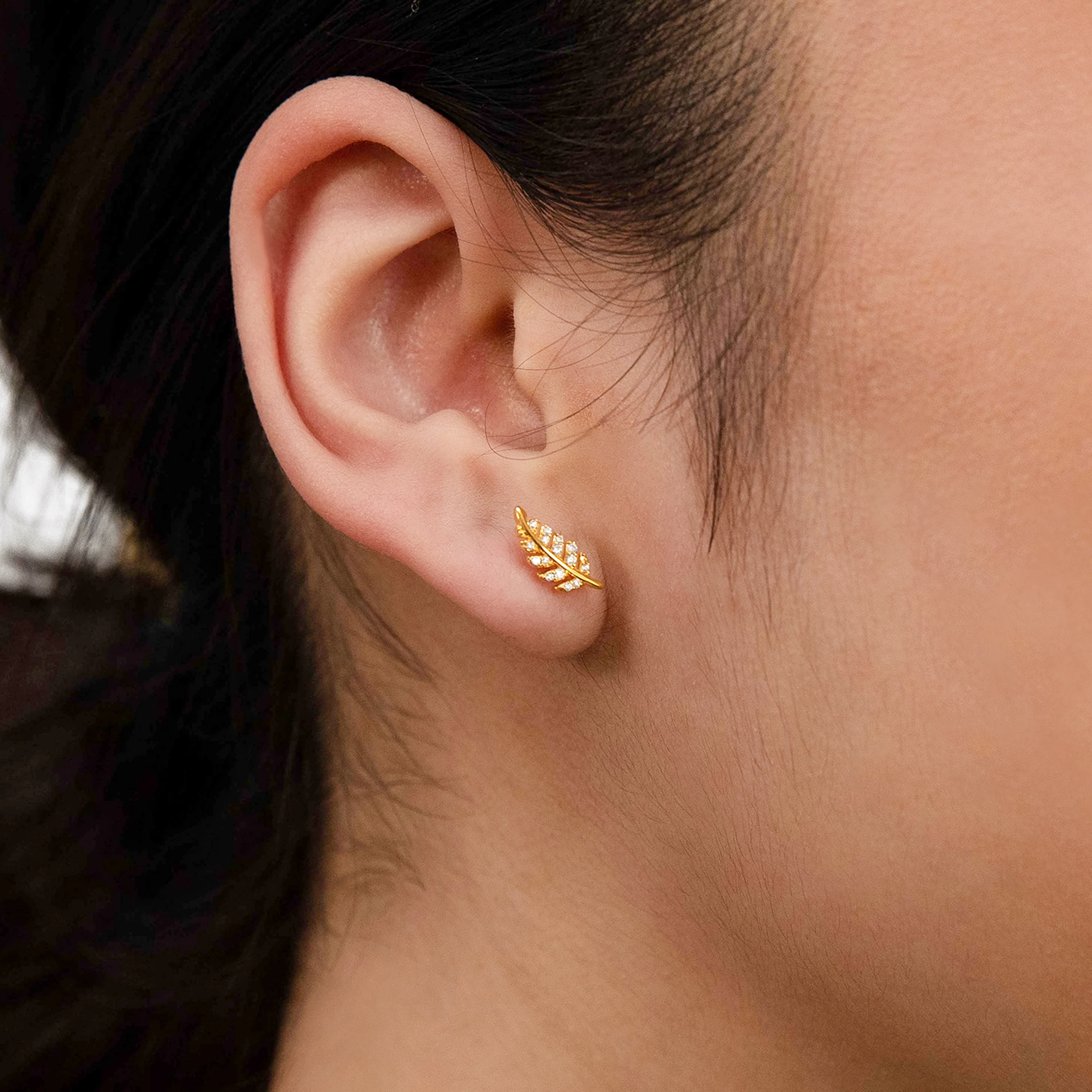 Sterling Silver Gold Plated Cubic Zirconia On Feather Stud Earrings - Image 2