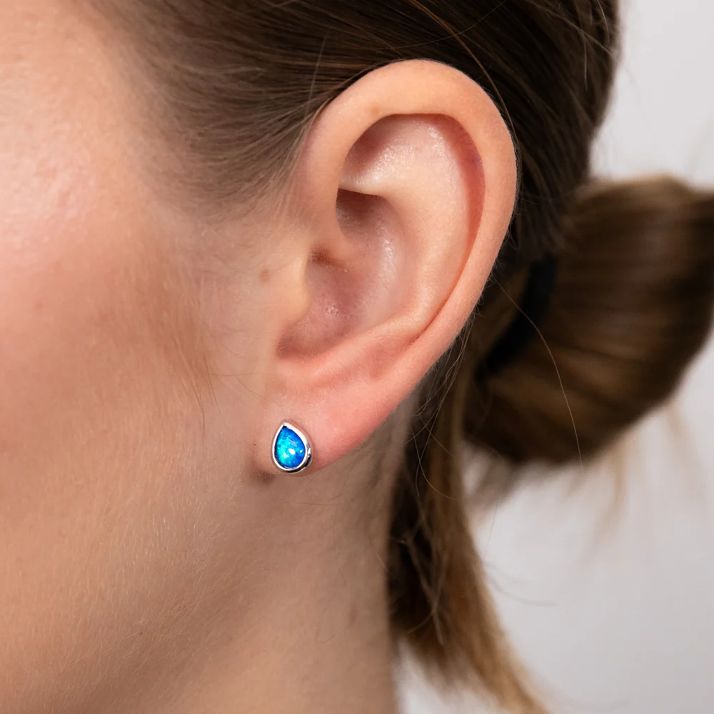 Sterling Silver Pear Shaped Created Blue Topaz Stud Earrings - Image 2