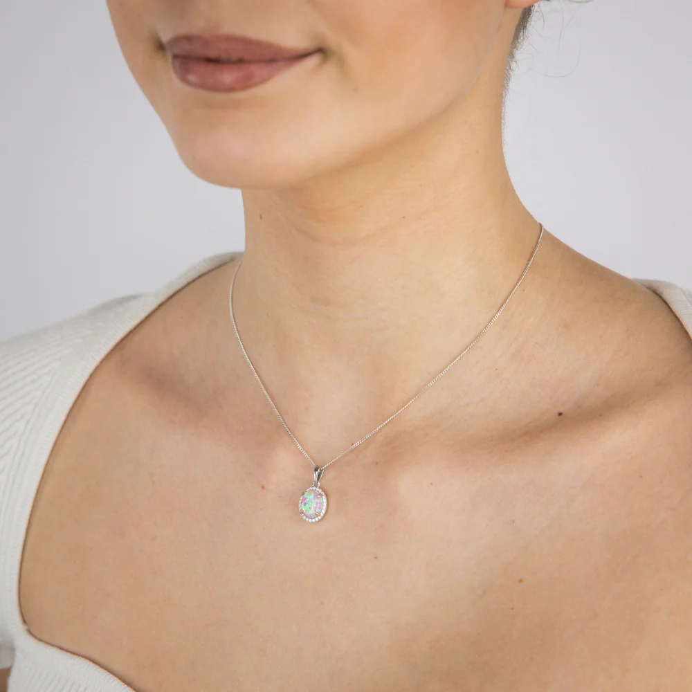 Sterling Silver Rhodium Plated Cubic Zirconia Created Pink Opal Oval Pendant - Image 2