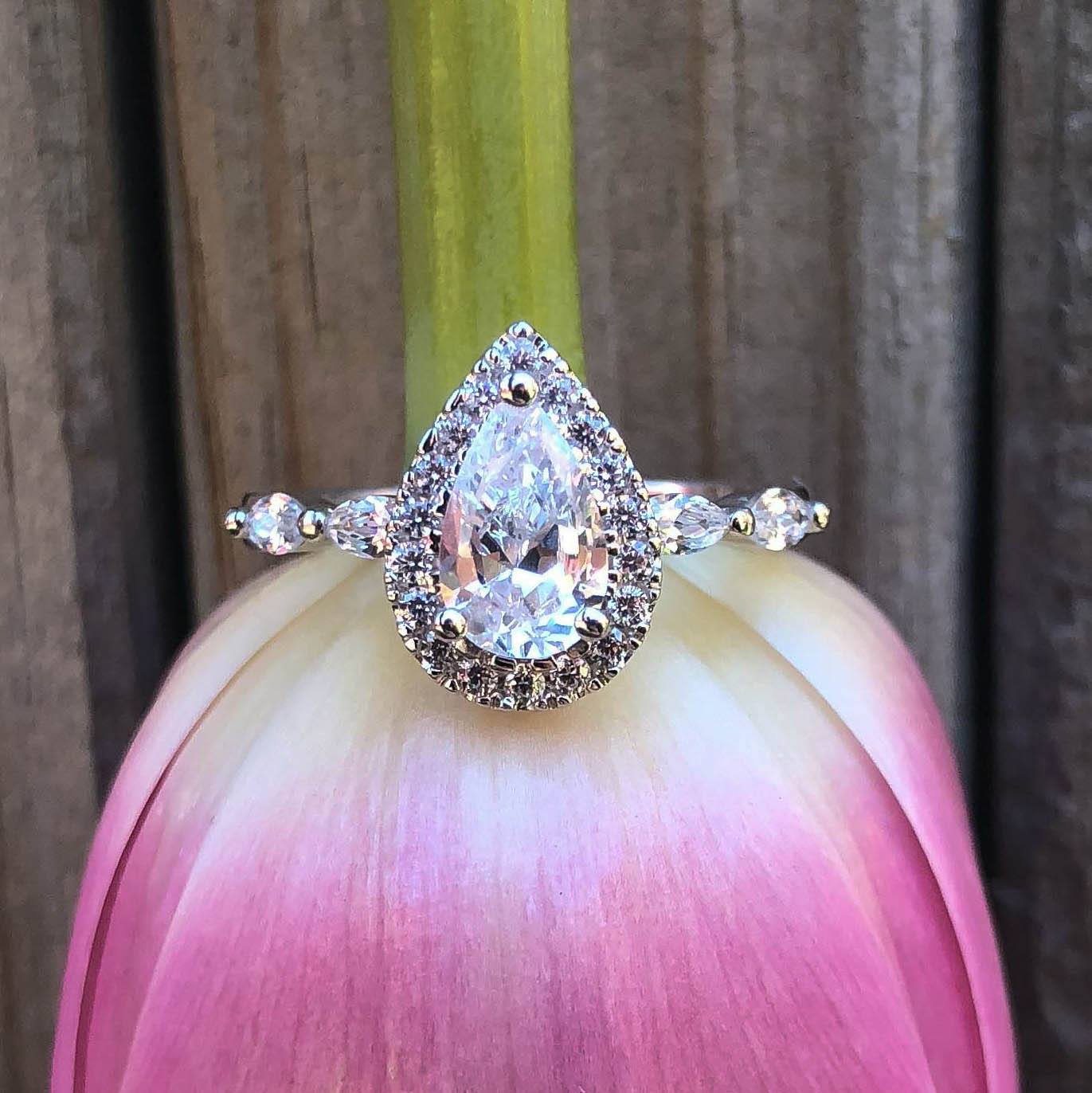 Sterling Silver Rhodium Plated Cubic Zirconia Pear Halo Ring with Marquise Band - Image 3