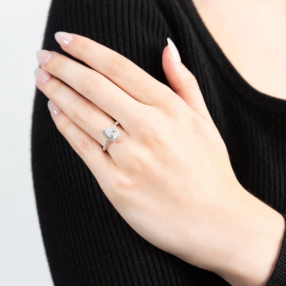Sterling Silver Rhodium Plated Cubic Zirconia Pear Halo Ring with Marquise Band - Image 4