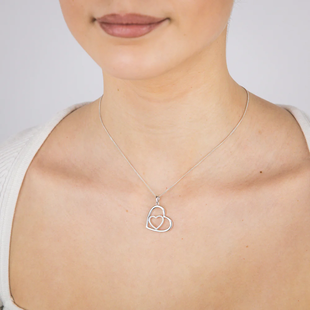Sterling Silver Rhodium Plated Cubic Zirconia Tilted double Heart Pendant - Image 2