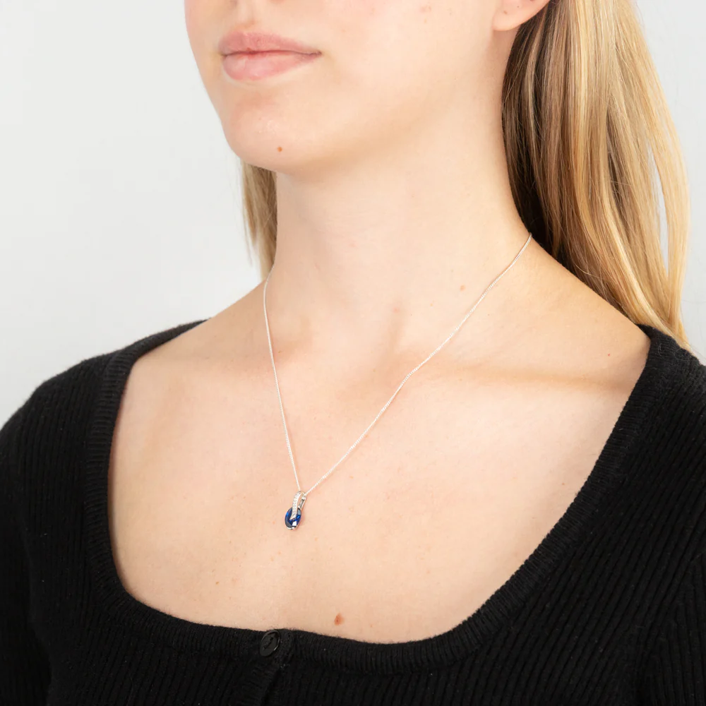 Sterling Silver Rhodium Plated Oval Synthetic Spinel Cubic Zirconia Crossover Pendant - Image 2
