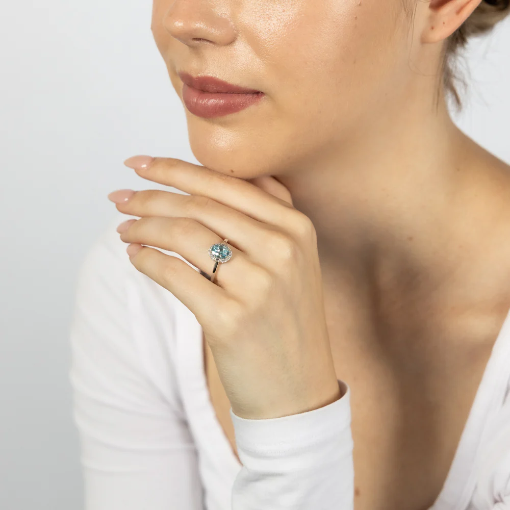 Sterling Silver Rhodium Plated White And Aquamarine Cubic Zirconia Oval Ring - Image 3