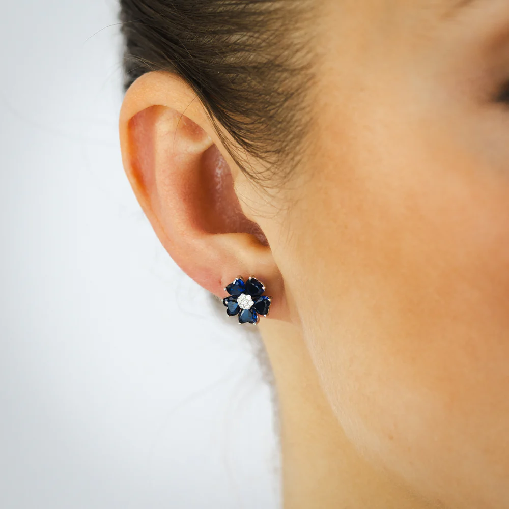 Sterling Silver Rhodium Plated White And Sapphire Blue Cubic Zirconia Flower Stud Earrings - Image 2