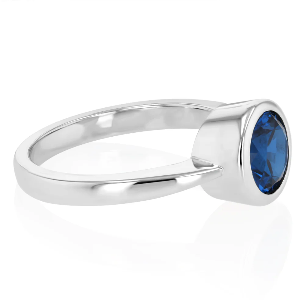 Sterling Silver Round Bezel Set Sapphire Blue Cubic Zirconia Ring - Image 2